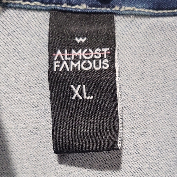Almost Famous Women's Denim Jacket in a blue wash.  - Picture 4 of 5